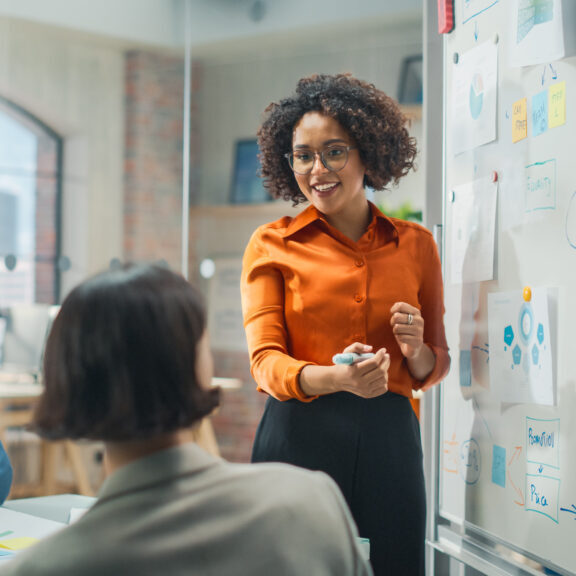 Diverse Office Conference Room Meeting: Successful Black Female